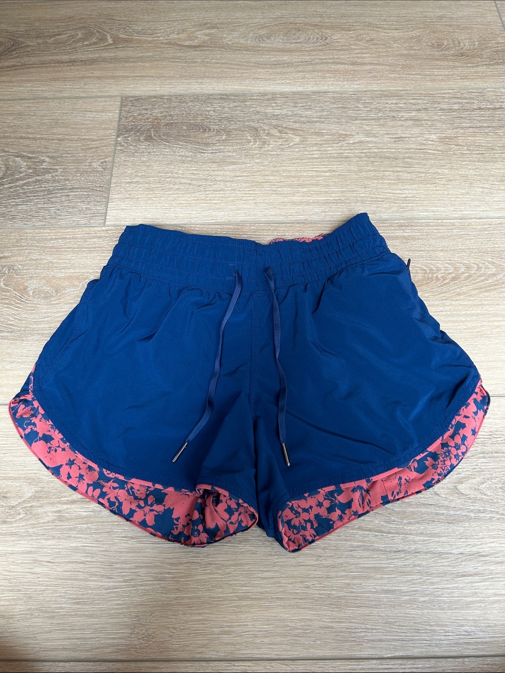 lululemon athletica Navy Athletic Shorts with Pink Floral Hem